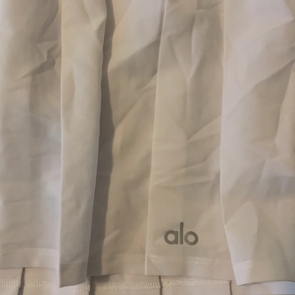Alo varsity tennis skirt in white